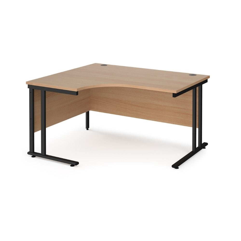1400mm ergonomic left hand corner desk featuring a curved wood effect desktop, integrated modesty panel, twin cable ports and black steel frame for professional office use