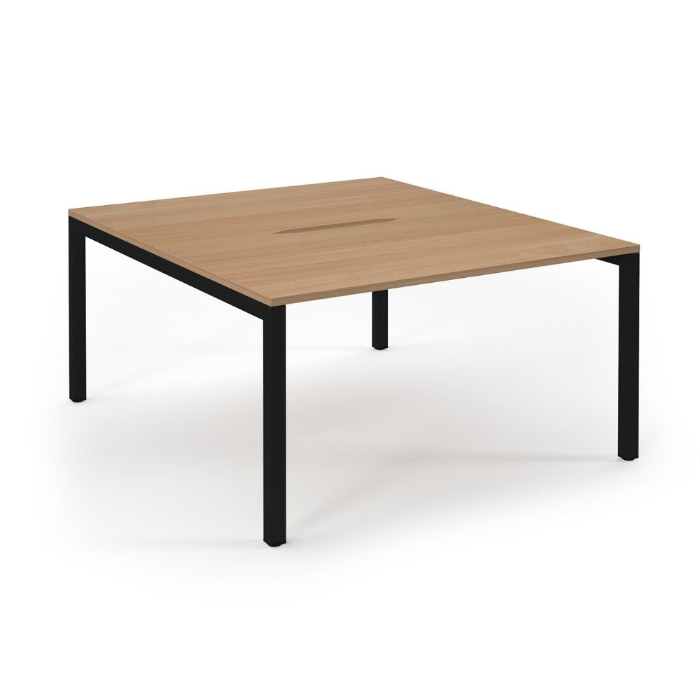 Modern 4-person office bench desk measuring 1400mm x 1600mm with a natural wood-finish top, black frame, and integrated central cable access slot.