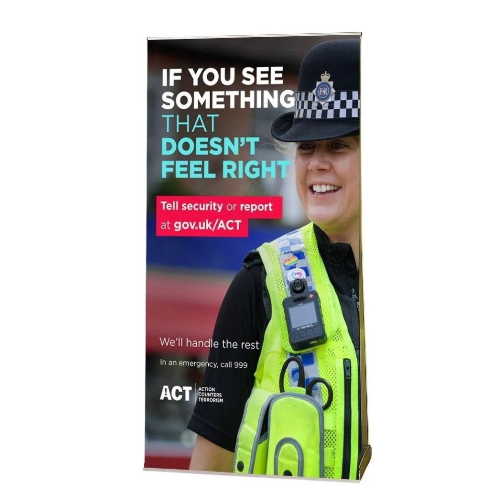 ACT counter-terrorism banner stand with public safety message and soft bag for secure campaigns.