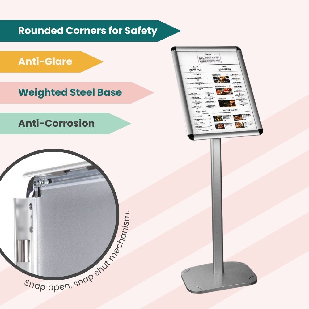 Freestanding angled sign holder with snap-open frame and feature tags for rounded corners, anti-glare surface, and corrosion-resistant steel base.