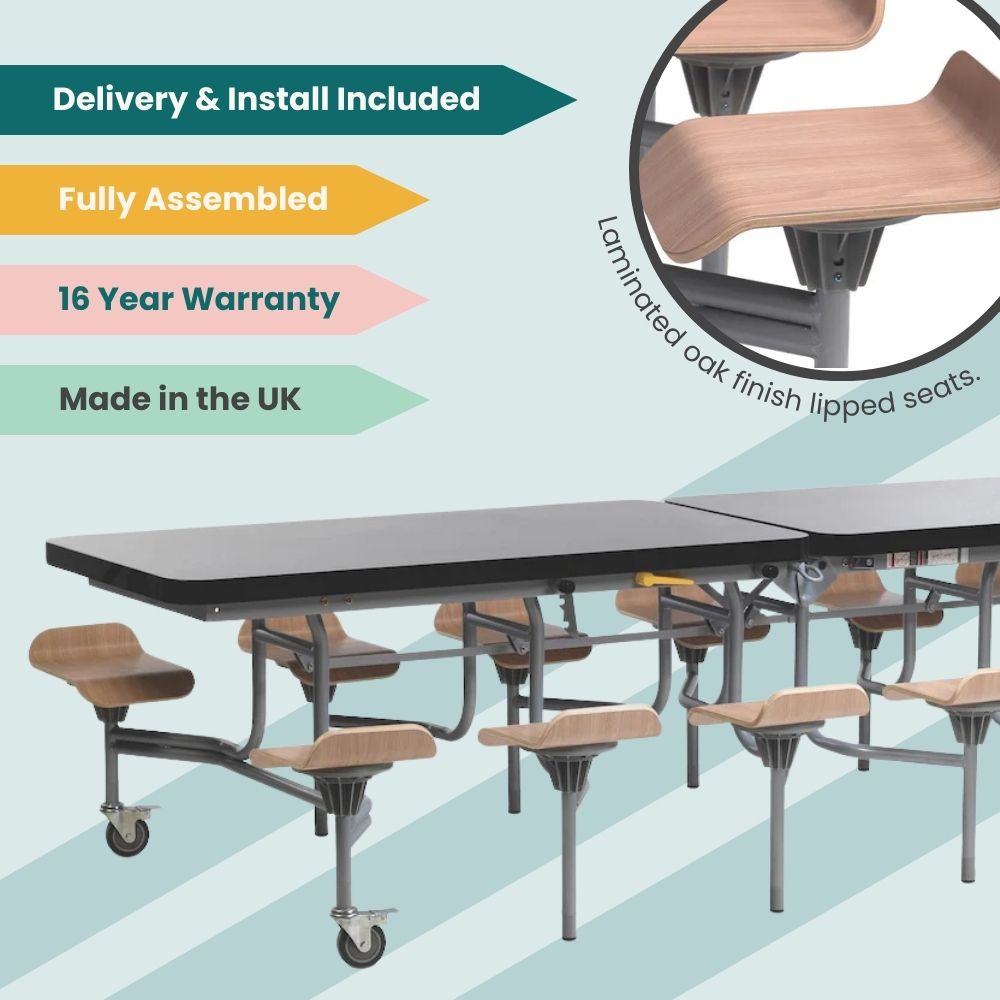 Black folding cafeteria table with laminated oak finish lipped seats and grey frame on wheels, fully assembled with delivery and installation included, backed by a 16-year warranty and made in the UK