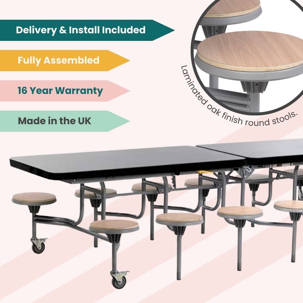 Black laminate folding cafeteria table with laminated oak finish round stools and grey frame on wheels, supplied fully assembled with delivery and installation included, backed by a 16-year warranty and made in the UK