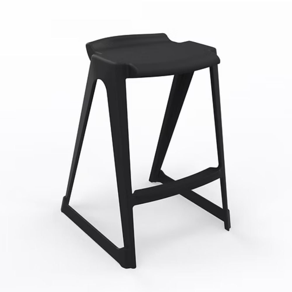 A professional black low back stool featuring a charcoal-pigmented polymer shell and an integrated anti-tip safety framework, standing at a 610mm seat height for technical workstations.