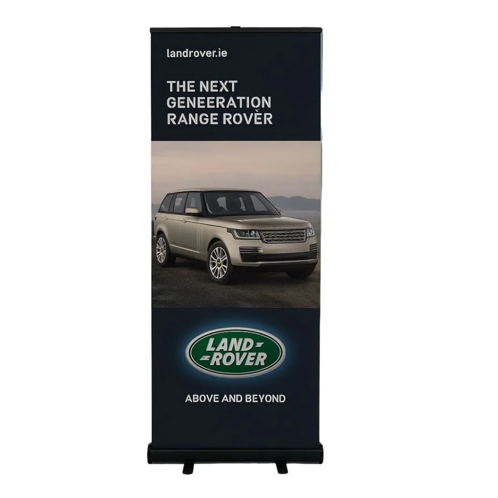 Black roller banner stand with Land Rover vehicle and branding, ideal for automotive promotions and events.