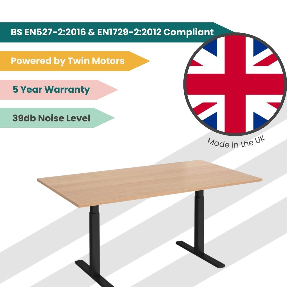 Height-adjustable standing desk made in the UK, featuring twin motors, black T-frame legs, a wood-finish top, quiet 39dB operation, and 5-year warranty, compliant with BS EN527-2:2016 and EN1729-2:2012 standards.