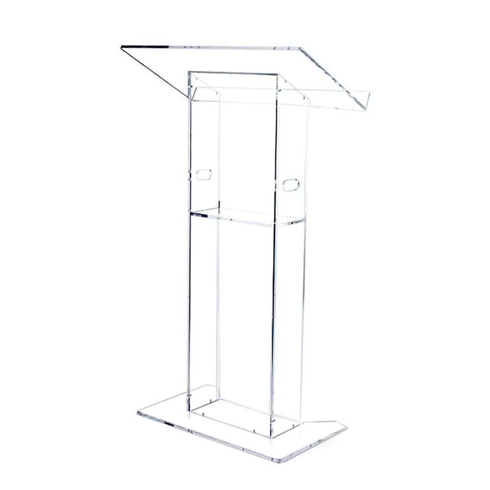 Transparent acrylic podium with slanted top, middle shelf, and wide base, designed for sleek presentations and easy transport.