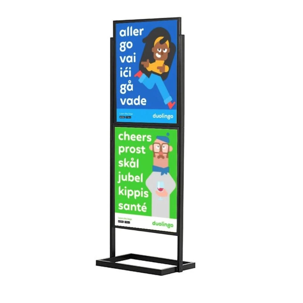 Freestanding Duolingo display with two stacked panels showing multilingual phrases for “go” and “cheers,” designed for educational promotion.