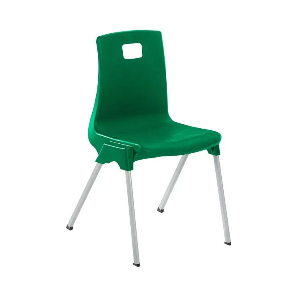 Green plastic chair with angled silver legs and cutout backrest, designed for classroom durability and stacking.