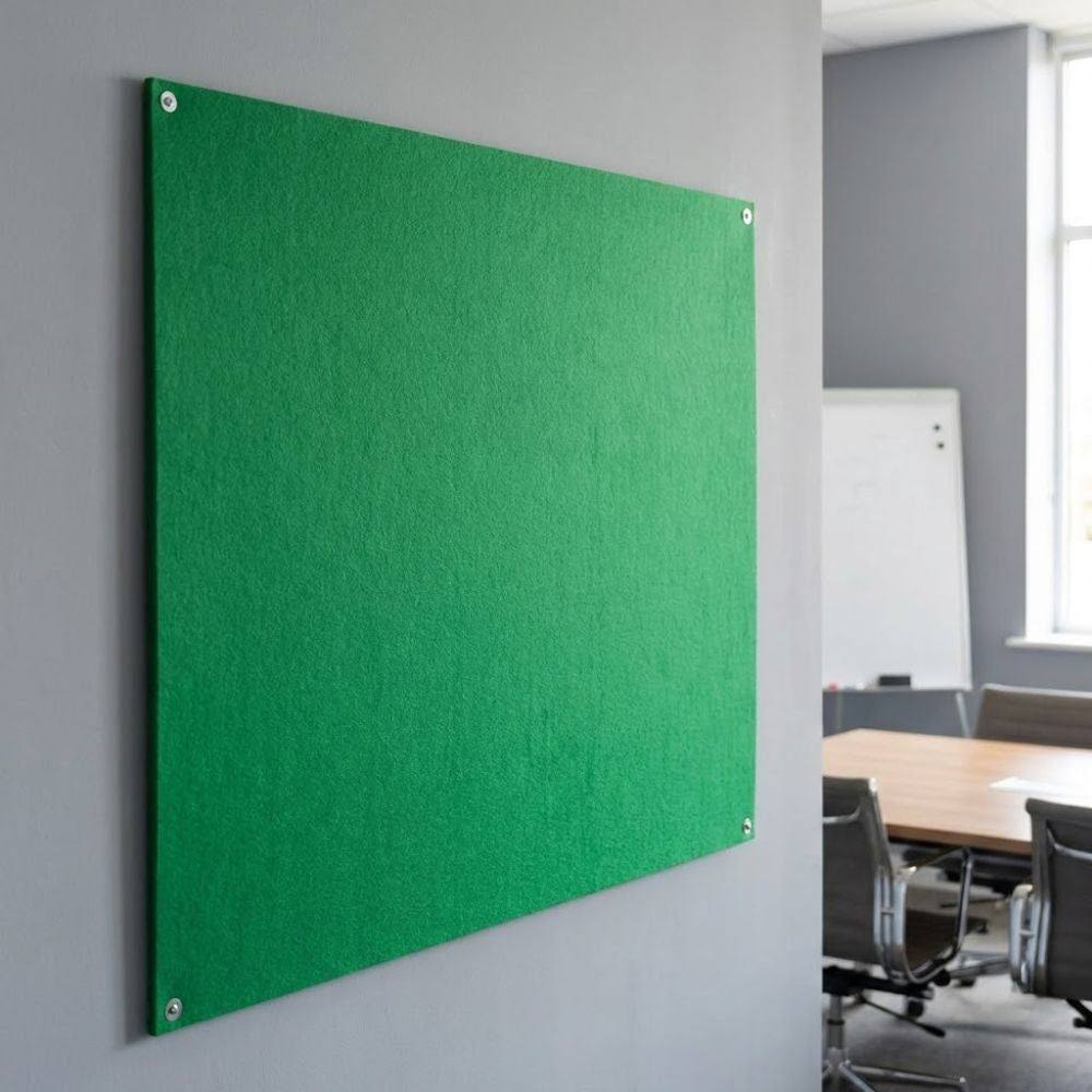 Green unframed felt noticeboard measuring 1200mm x 900mm, rectangular wall mounted board installed in a contemporary meeting room.