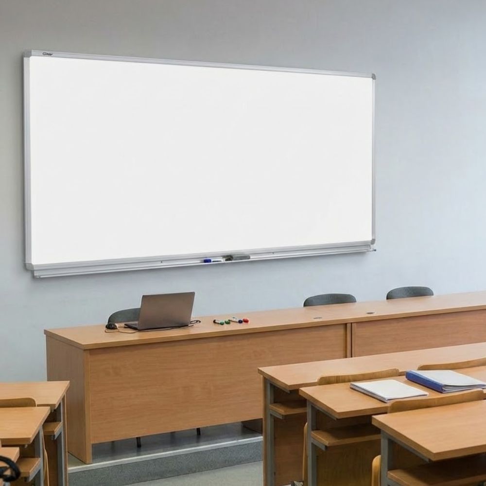 A massive 2400 x 1200mm landscape Vitreous Enamel Steel (VES) magnetic whiteboard installed in a tiered university lecture hall, featuring a high-gloss ceramic-steel surface and professional silver aluminium trim.