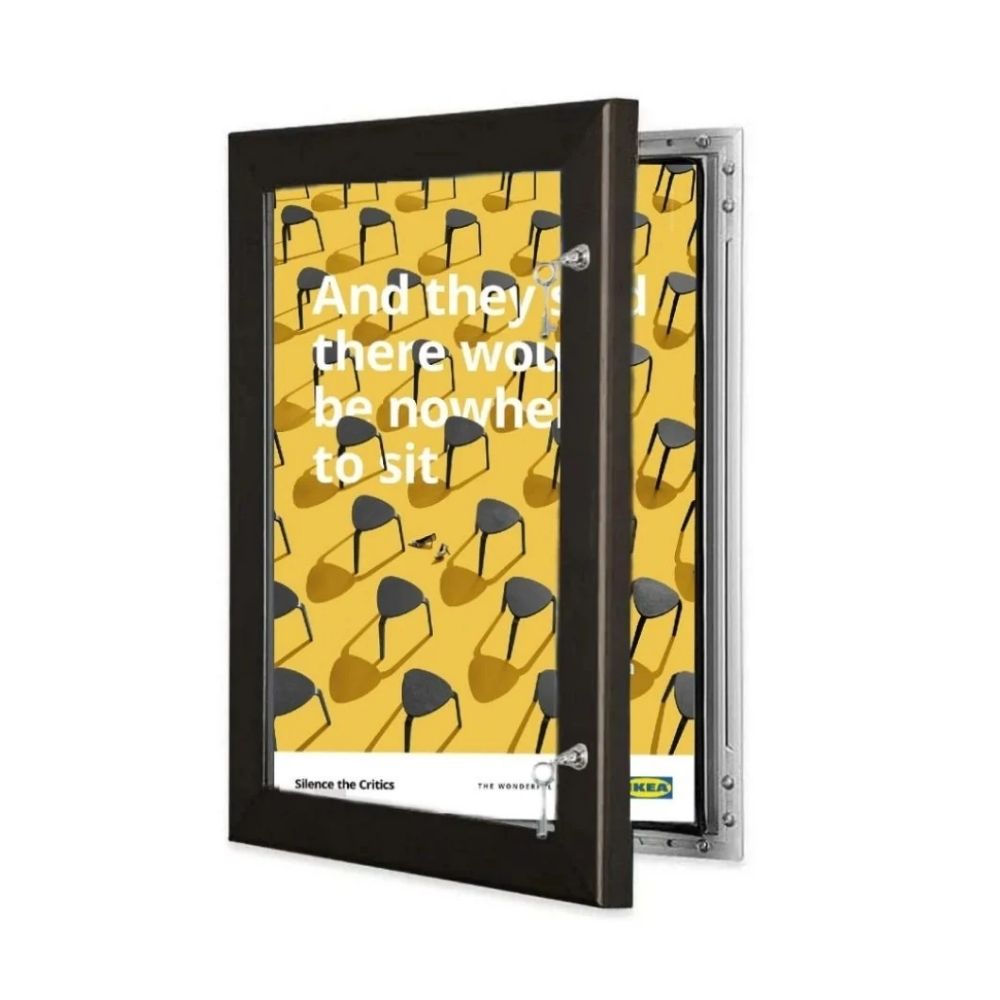 IKEA poster with grid of black chairs and bold yellow backdrop, designed to challenge seating assumptions.