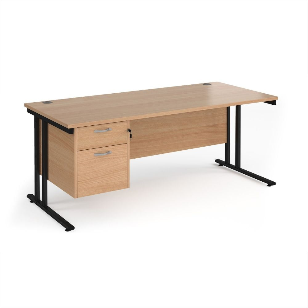 Large professional office desk with extended wooden work surface, fixed storage pedestal and strong industrial style leg supports for demanding environments
