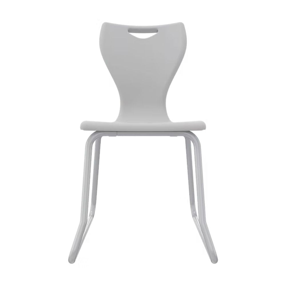 A modern dove grey student chair for ages 14 plus, featuring fatigue-reducing seat contours and a wide-set steel skid frame for balanced floor pressure.