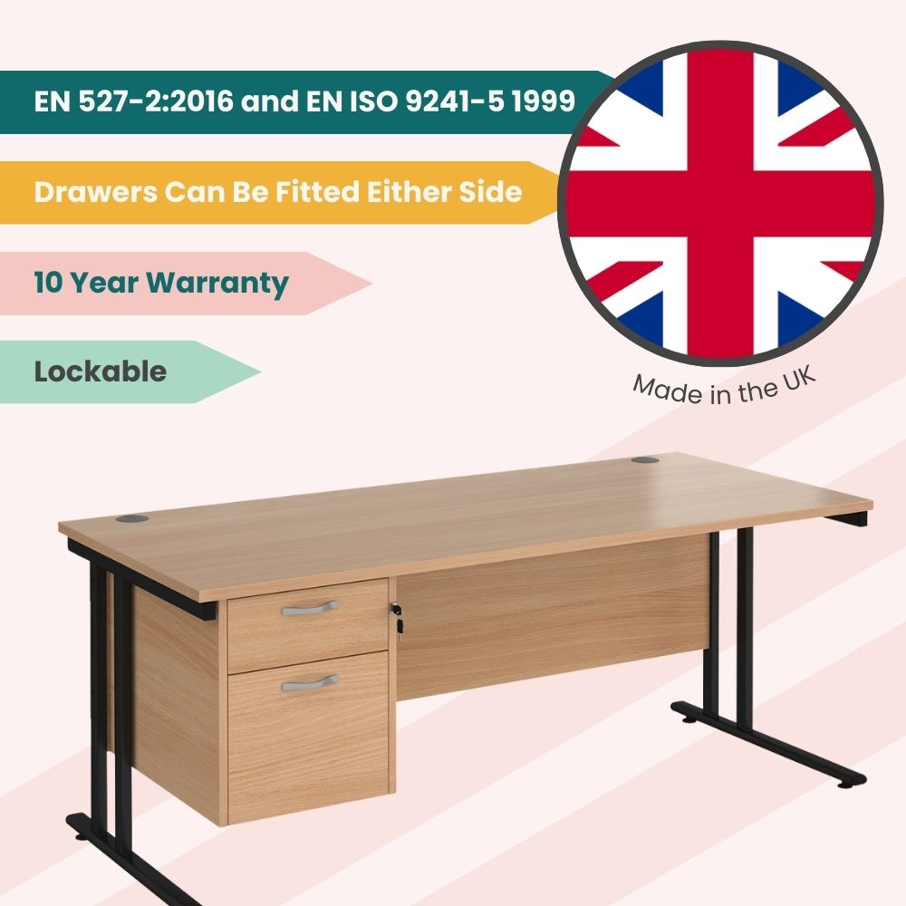 Rectangular office desk made in the UK, featuring a two-drawer lockable pedestal, modesty panel, and cable ports, with drawers installable on either side and a 10-year warranty.