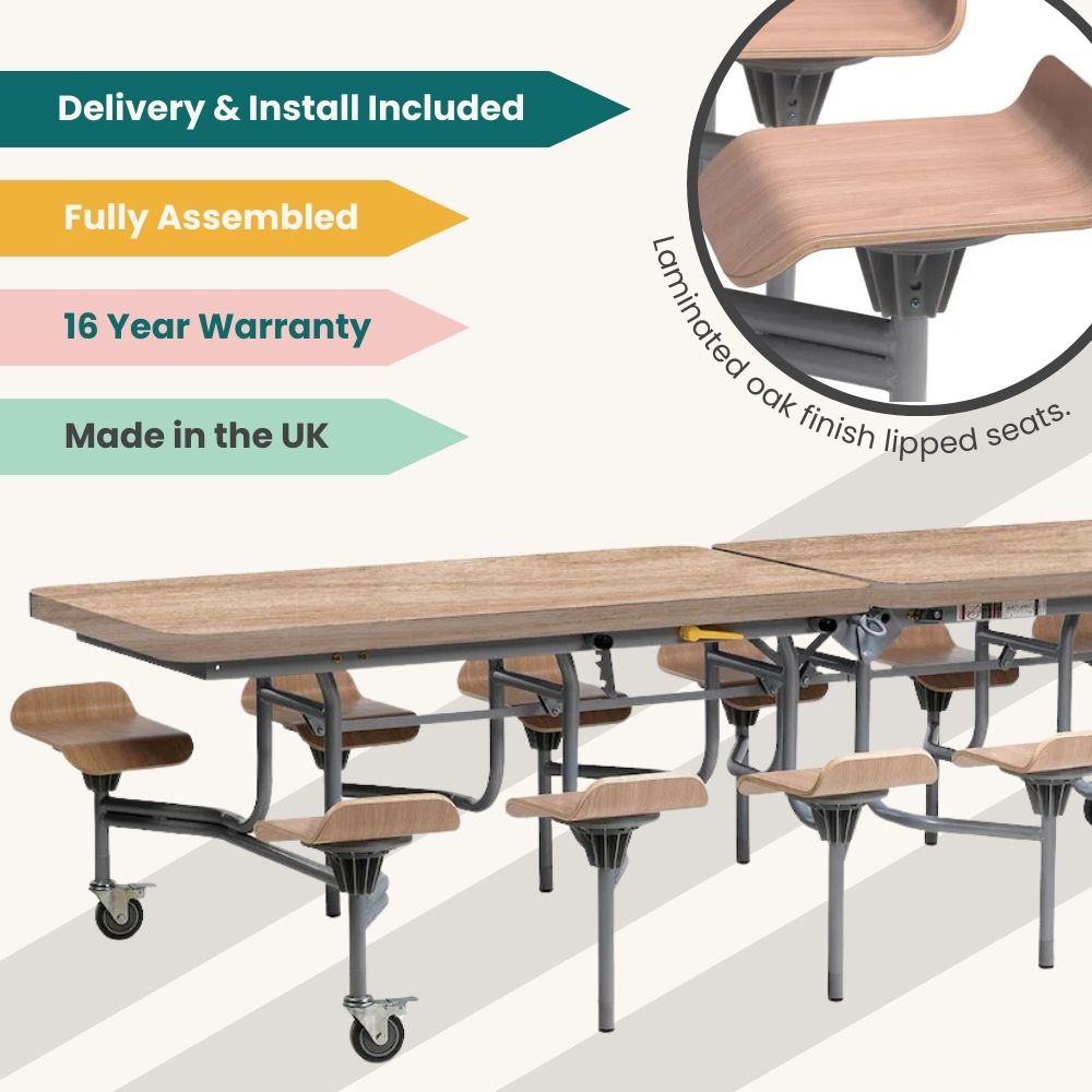 Oak finish folding cafeteria table with laminated lipped seats and grey frame on wheels, fully assembled with delivery and installation included, backed by a 16-year warranty and made in the UK