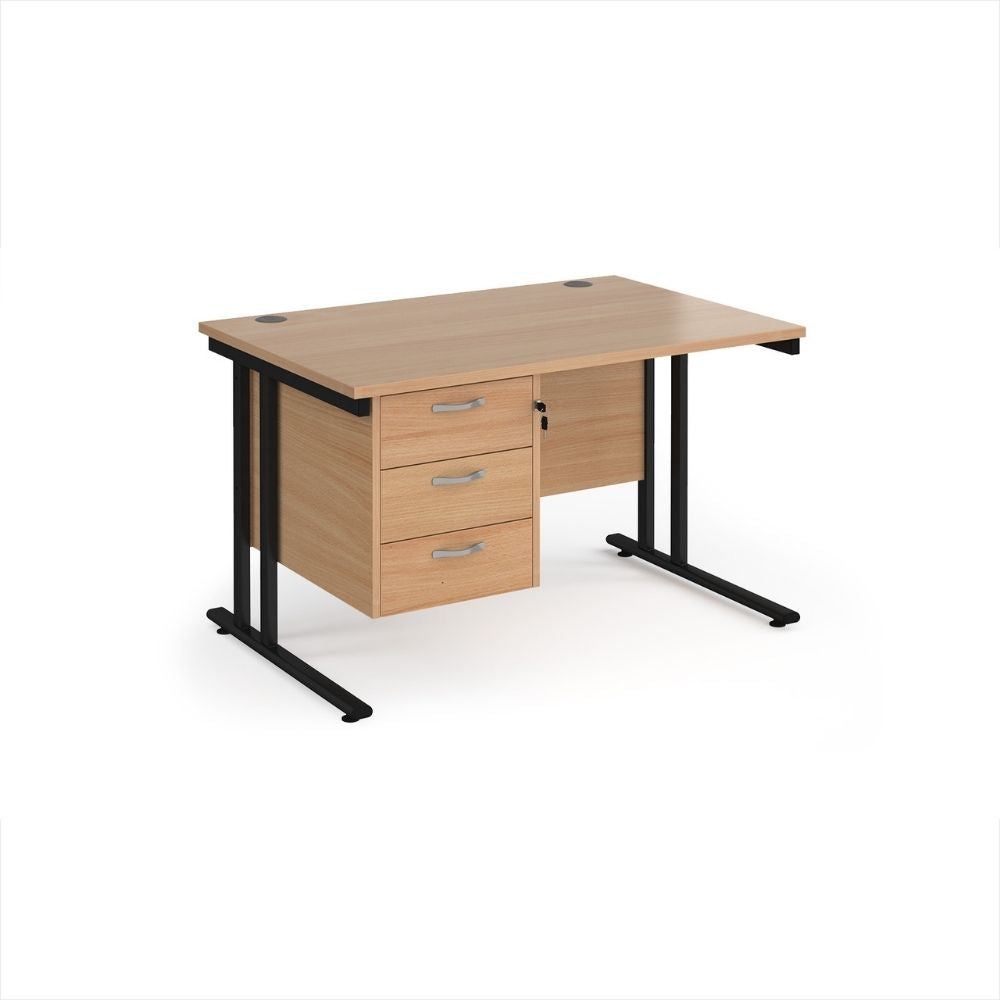 Office desk featuring a wood effect tabletop, full height three drawer pedestal, integrated cable ports and black metal leg supports for everyday professional use