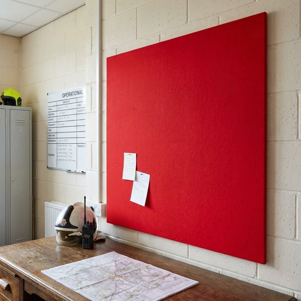 Red unframed felt noticeboard measuring 1500mm x 1200mm, large wall mounted board displayed in a workplace setting with notes pinned to the surface.