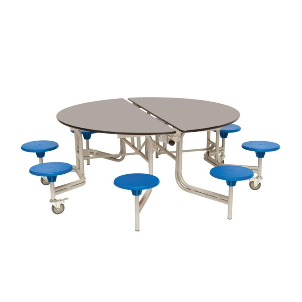 Circular dining table split into two folding halves with eight blue stools and mobile base.