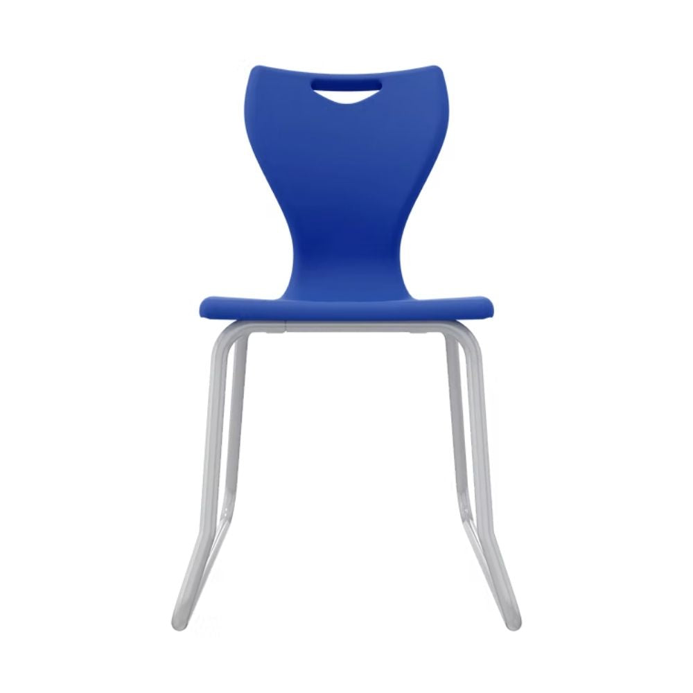 A royal blue secondary school chair featuring a U-shaped steel skid frame for balanced weight distribution and improved lumbar alignment for older pupils.