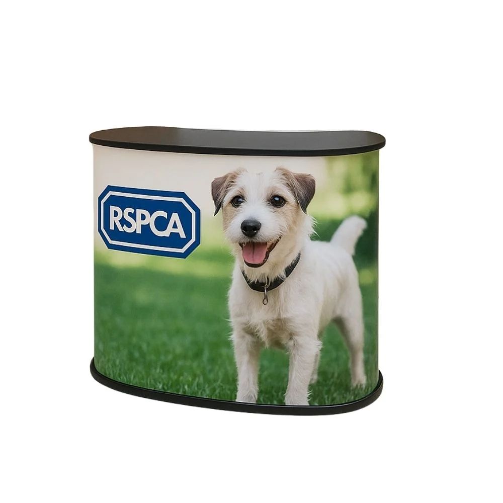 Curved RSPCA promotional counter with dog photo and logo, ideal for awareness campaigns and charity event branding.