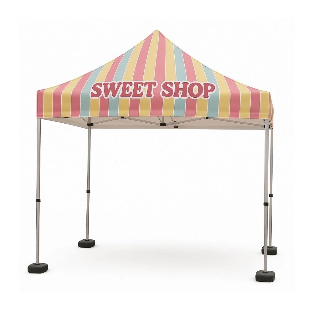 Colourful striped SWEET SHOP canopy tent with bold pink lettering and metal legs, designed to attract attention at fairs, markets, or pop-up events.