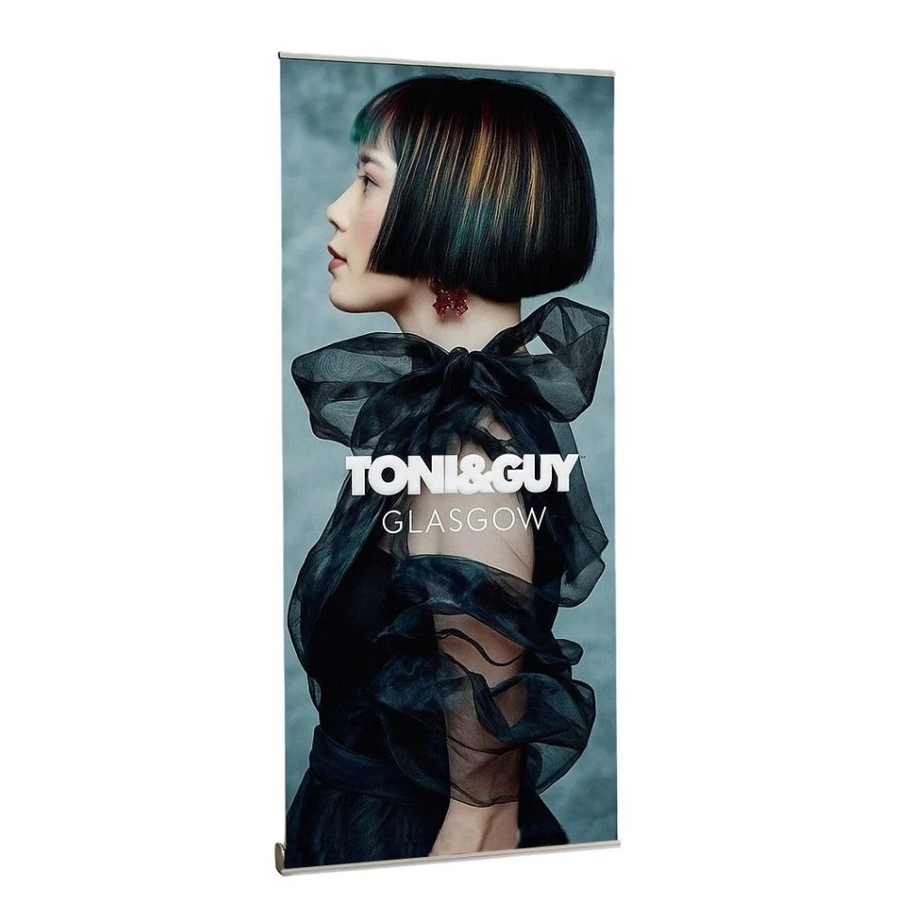 TONI&GUY Glasgow banner featuring sleek bob haircut with multicolour highlights and fashion styling.