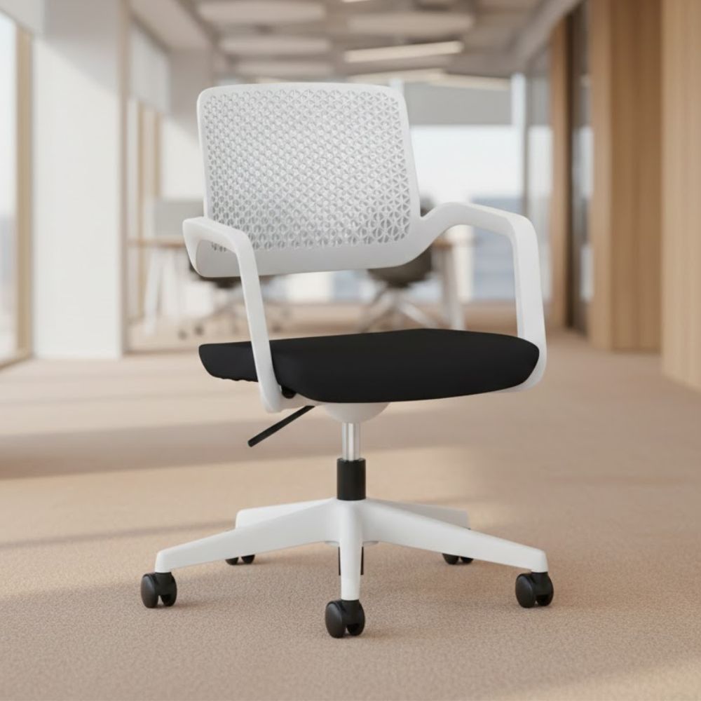 White swivel office chair with perforated plastic backrest, black cushioned seat and five star base with castors, positioned in a contemporary open plan office i