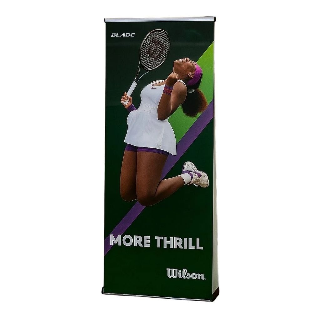 Wilson Blade tennis banner with green and purple background and dynamic player action shot.