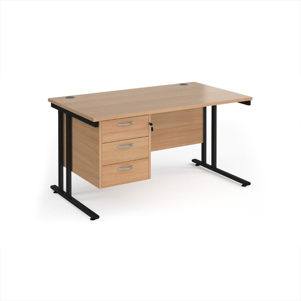 Office desk with light wood finish work surface, three drawer under desk storage unit, twin cable access ports and reinforced steel leg frame for commercial offices
